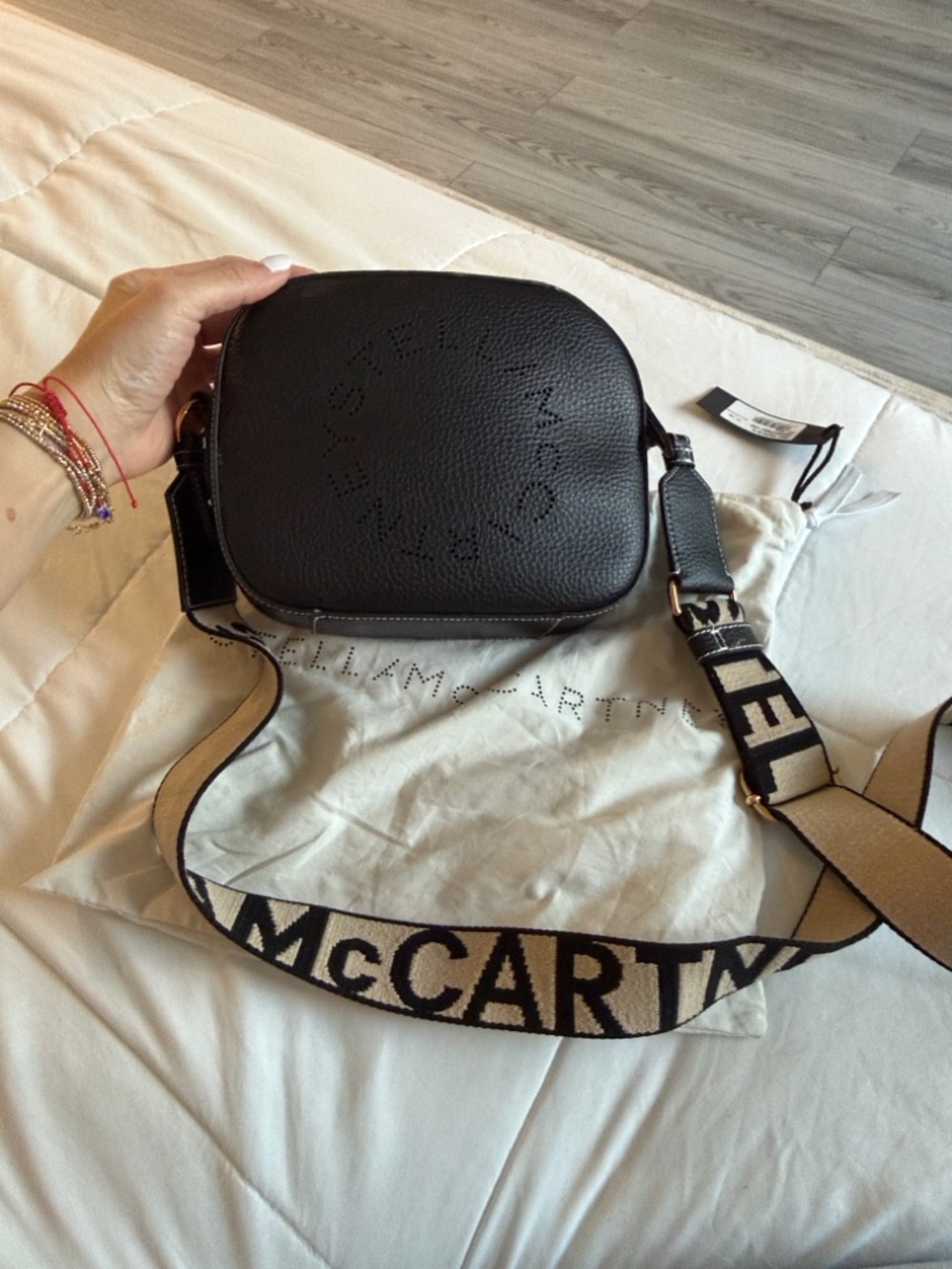 Stella McCartney Black Pebbled Round Crossbody with Branded Beige Strap